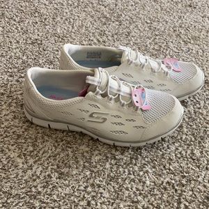 New white sketchers flex slip on wide fit sneakers w/ air-cooled memory foam